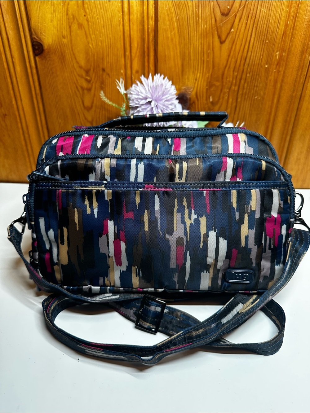 lug Navy Crossbody Bag with Pink and Cream Brushstroke Pattern
